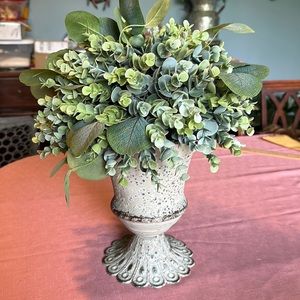 Decorative faux plant with separate urn style container